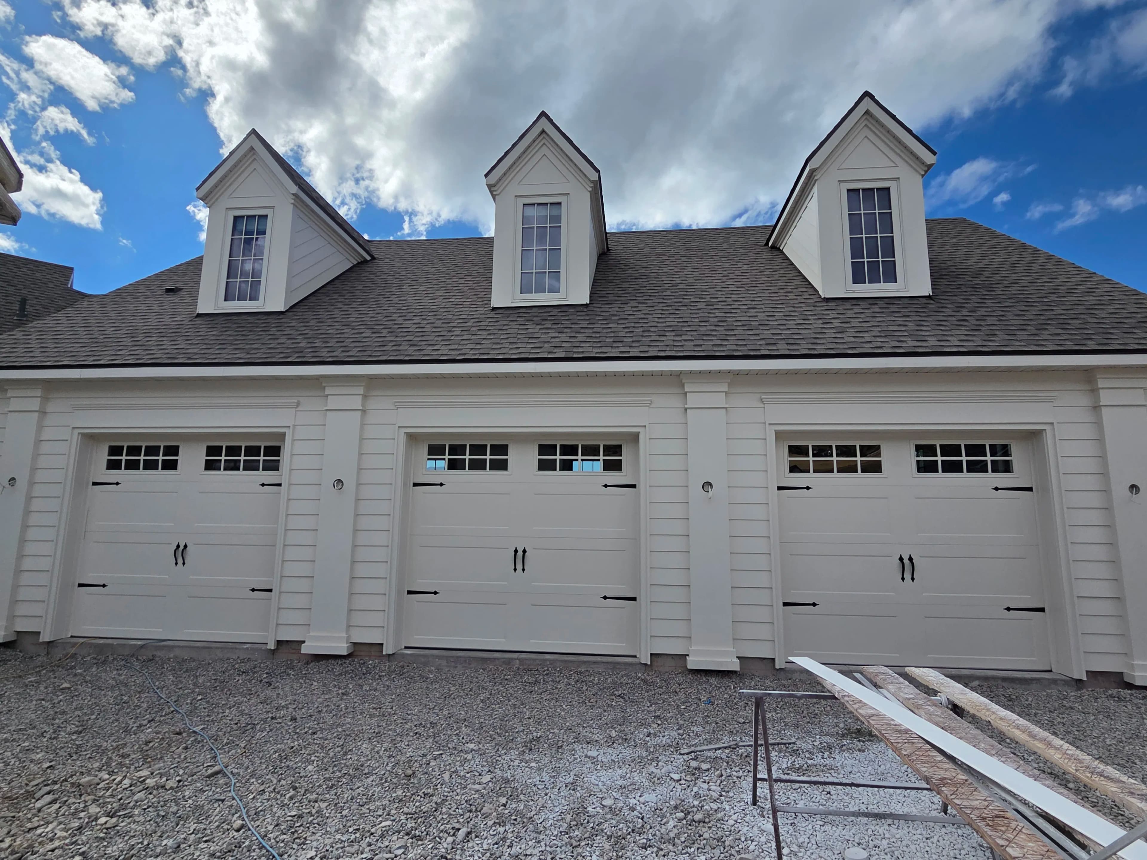 Project Bridgeport Extended Panel Garage Doors in White - Clean Curb Appeal on a Budget image