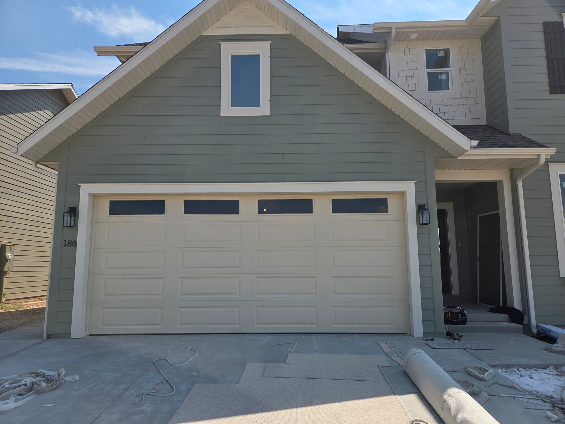 Desert Tan Garage Door Installation That Nails the Curb Appeal