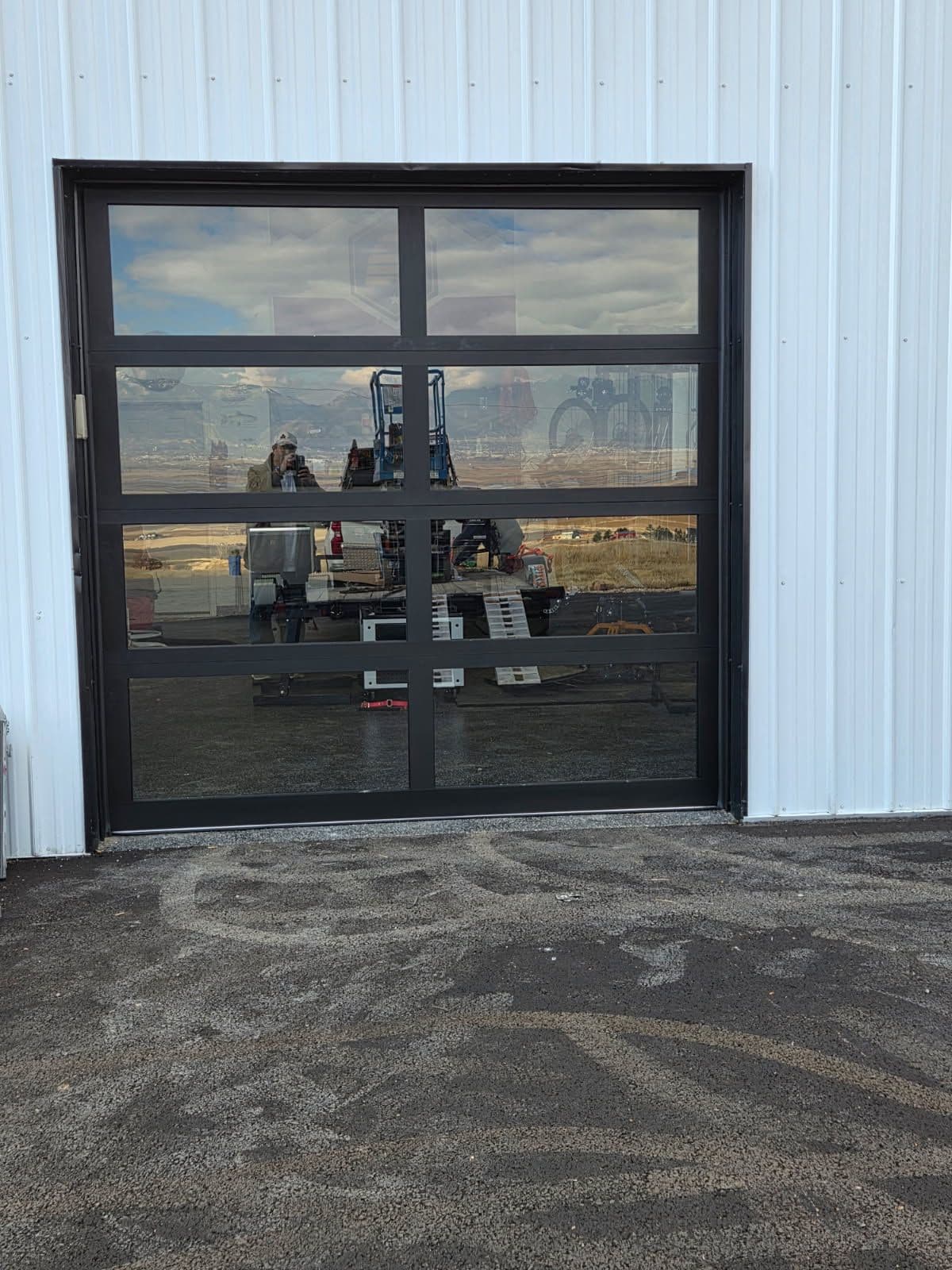 Sleek Black Garage Door Upgrade Boosts Curb Appeal