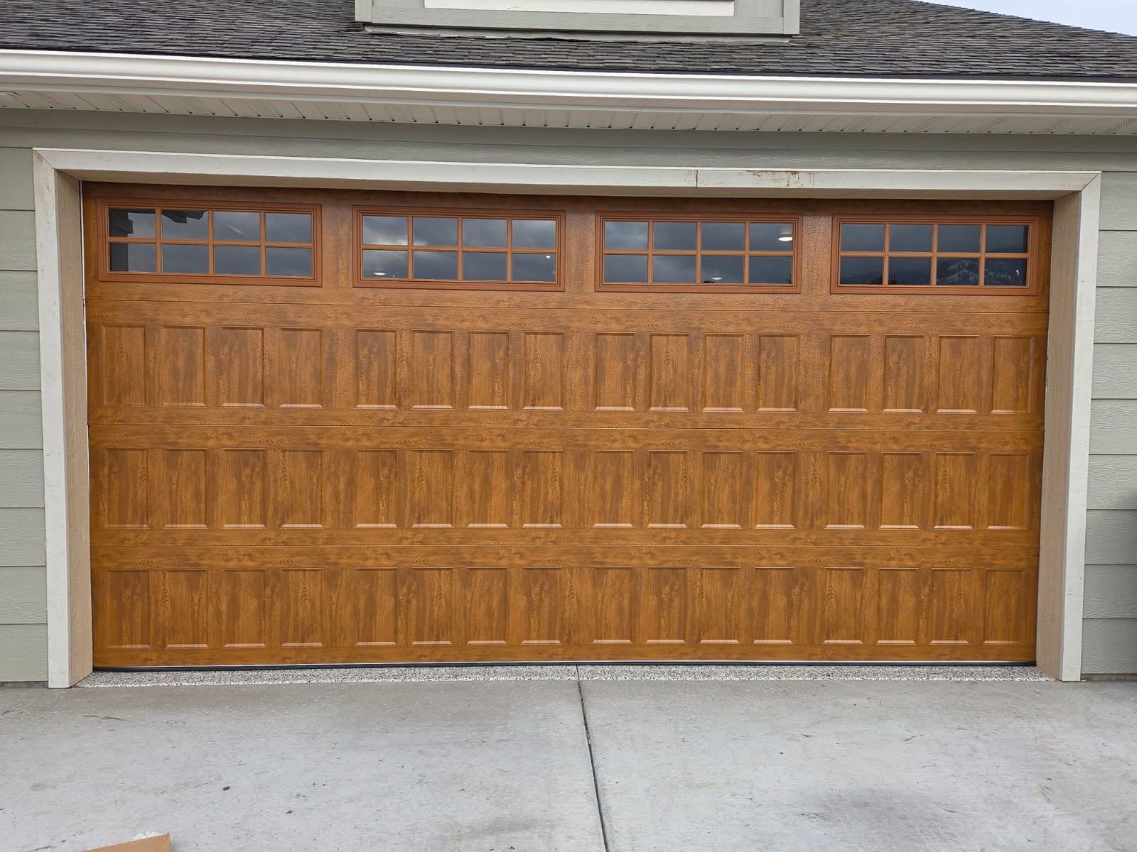 Stunning Ultra Grain Oak Medium Garage Door Installation image